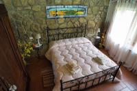 A bed or beds in a room at Agriturismo Biagiotti