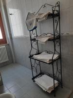 Palanda nebo palandy na pokoji v ubytování LE CALLE a VIESTE sul Gargano