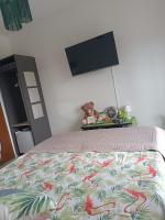 Łóżko lub łóżka w pokoju w obiekcie In Casa ZoE