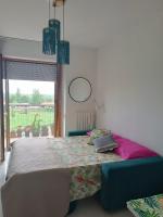 Łóżko lub łóżka w pokoju w obiekcie In Casa ZoE