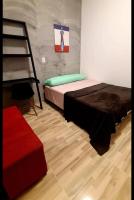 a bedroom with a bunk bed and a ladder at Pousada QUERÊNCIA FRANCÊS in Marechal Deodoro