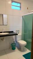 a bathroom with a toilet and a sink at Pousada QUERÊNCIA FRANCÊS in Marechal Deodoro