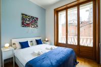 Posteľ alebo postele v izbe v ubytovaní Duomo Center Apartment