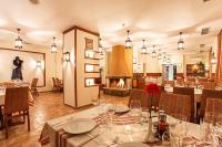 En restaurant eller et andet spisested på MyPlace Pamporovo 2