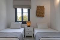 Postel nebo postele na pokoji v ubytování La Mer Residences