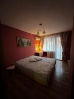 Postel nebo postele na pokoji v ubytování GREAT Apartament