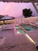 The swimming pool at or close to Georgioupoli Villa with heated private pool and BBQ