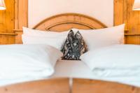 Posteľ alebo postele v izbe v ubytovaní Hotel Erika