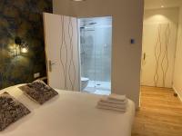 La Maison Blancheにあるベッド