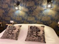 La Maison Blancheにあるベッド