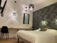 La Maison Blancheにあるベッド