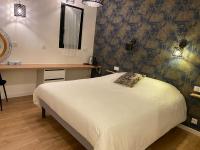 La Maison Blancheにあるベッド