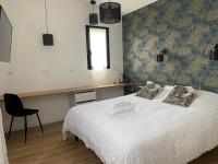 La Maison Blancheにあるベッド
