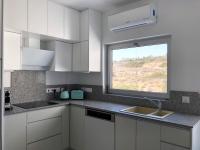 Kuchyň nebo kuchyňský kout v ubytování Alania Sea View Apartment