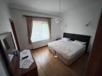Postel nebo postele na pokoji v ubytování Aktaş Gümüşyaka Villaları