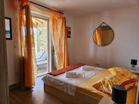 Postel nebo postele na pokoji v ubytování Oasis apartment