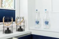 Nápoje v ubytovaní Apartament 1B Niebieskie Apartamenty Poddąbie dawniej Blue Marine z basenem krytym, odkrytym, salą zabaw, animacjami