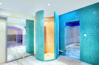Posteľ alebo postele v izbe v ubytovaní Hotel Hanioti Village Spa