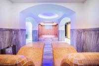 Posteľ alebo postele v izbe v ubytovaní Hotel Hanioti Village Spa