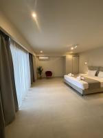 Posteľ alebo postele v izbe v ubytovaní Tereza's Sunset Hotel