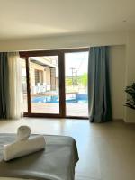 Posteľ alebo postele v izbe v ubytovaní Tereza's Sunset Hotel