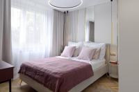 Posteľ alebo postele v izbe v ubytovaní Apartament nad morzem