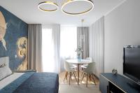 Televízia a/alebo spoločenská miestnosť v ubytovaní Apartament nad morzem