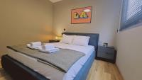 Postel nebo postele na pokoji v ubytování STAY Lima Soul Apartment
