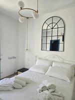 A bed or beds in a room at Terra Muronis Hotel Diffuso