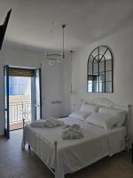 A bed or beds in a room at Terra Muronis Hotel Diffuso