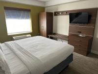 a hotel room with a bed and a flat screen tv at Holiday Inn Express Hotel & Suites San Dimas by IHG in San Dimas
