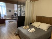 Posteľ alebo postele v izbe v ubytovaní le loft 19