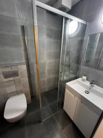 Koupelna v ubytování Apartments Dřevona II
