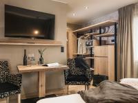 Telewizja i/lub zestaw kina domowego w obiekcie Hotel Sieghard Zillertal