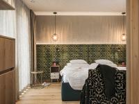 Łóżko lub łóżka w pokoju w obiekcie Hotel Sieghard Zillertal