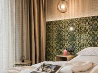 Łóżko lub łóżka w pokoju w obiekcie Hotel Sieghard Zillertal