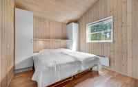 Postel nebo postele na pokoji v ubytování Holiday Home Klokkegrund Ebeltoft Vi