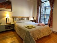 Una cama o camas en una habitación de Casa Moreno