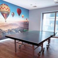 Stolní tenis v ubytování Sea & Palm View Elegant 1 Bedroom Apartment nebo okolí