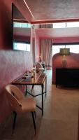 a room with a bed and a table and a chair at Hotel Ritual Torremolinos- Adults Only in Torremolinos