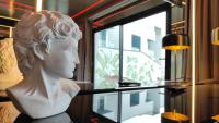 a bust of a woman looking out of a window at Hotel Ritual Torremolinos- Adults Only in Torremolinos