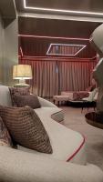 a living room with a couch and a table at Hotel Ritual Torremolinos- Adults Only in Torremolinos