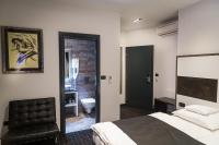 Posteľ alebo postele v izbe v ubytovaní Log In Rooms