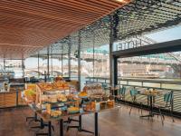 a bakery with a bunch of food on display at Hotel OFF Paris Seine in Paris