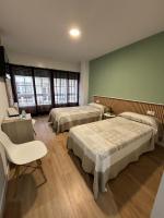 Posteľ alebo postele v izbe v ubytovaní Hostal La Frontera
