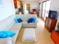 Posezení v ubytování GMID IMMO Apartamento Castell Joncar 3