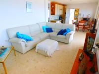 Posezení v ubytování GMID IMMO Apartamento Castell Joncar 3
