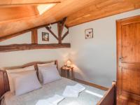 Łóżko lub łóżka w pokoju w obiekcie Le Tilleuil en Périgord