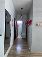 a hallway leading to a bathroom with at Pousada QUERÊNCIA FRANCÊS in Marechal Deodoro