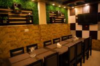 a dining room with a long table and chairs at Hotel paradise valley view Pvt ltd in Kathmandu